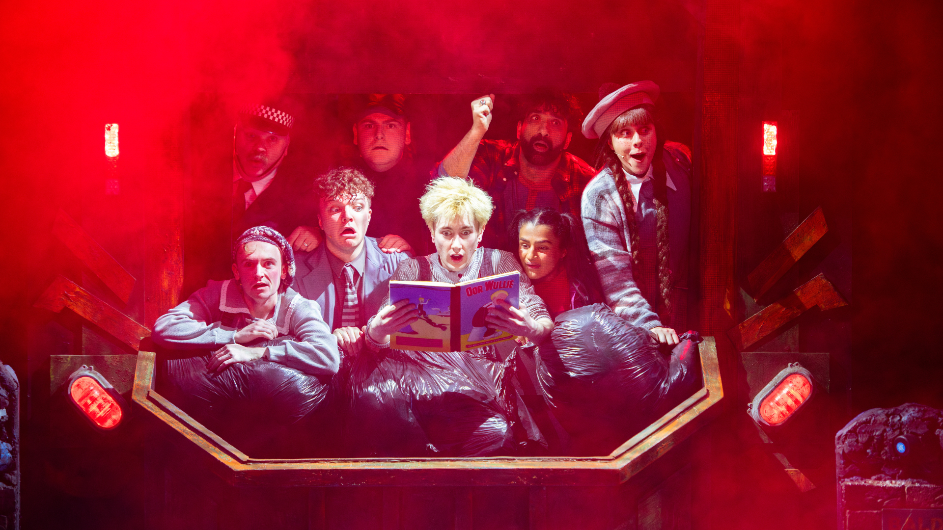 The cast of Oor Wullie in a skip