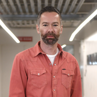 Andrew Panton wearing a salmon shirt